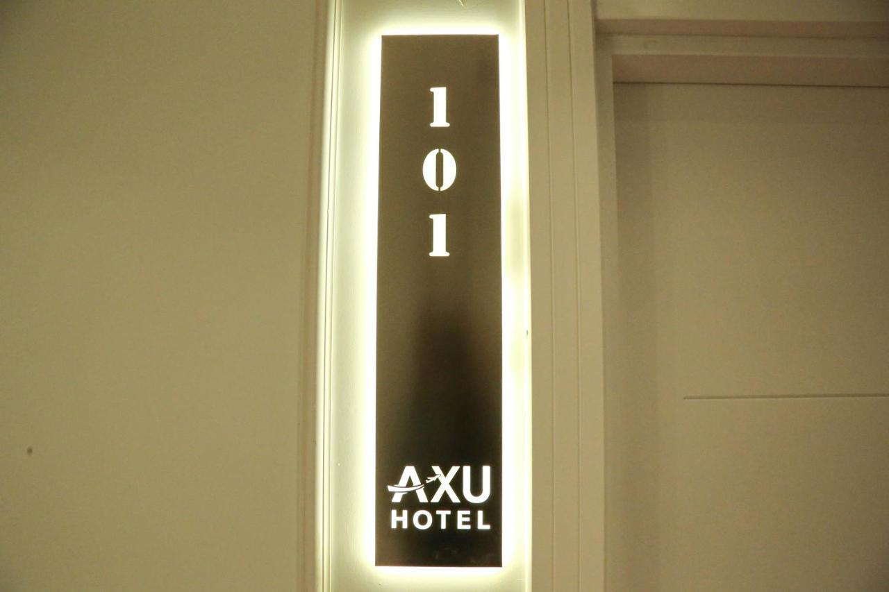 Axu Airport Hotel Arnavutkoy Esterno foto A room sign at Axu Hotel