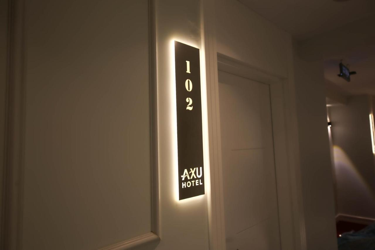 Axu Airport Hotel Arnavutkoy Esterno foto A room number sign